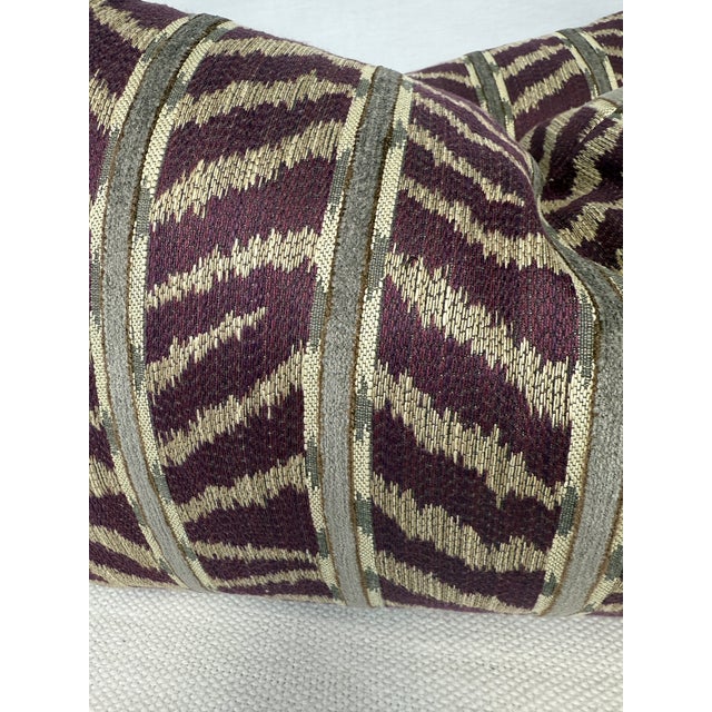 Custom pair of 12"x22" pillows covered in a woven zebra stripe fabric in grape. These pillows are knife edged, have serged...