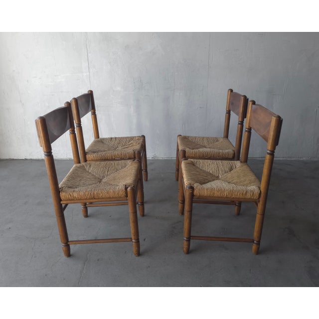 A truly handsome set of four Rustic European dining chairs crafted in solid wood with a warm, time-earned patina. Each...