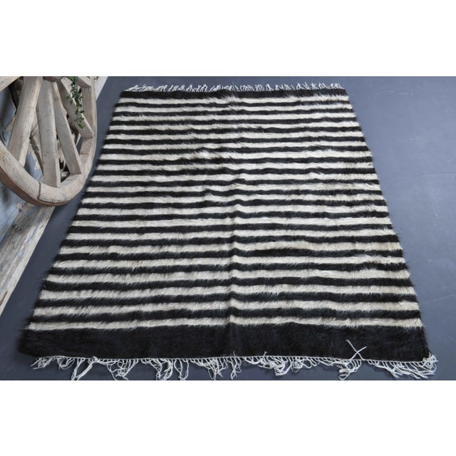 Vintage Turkish Hand-Knotted vintage rug is a semi-antique vintage kilim area rug.'70s Eastern region of Turkey's unique...