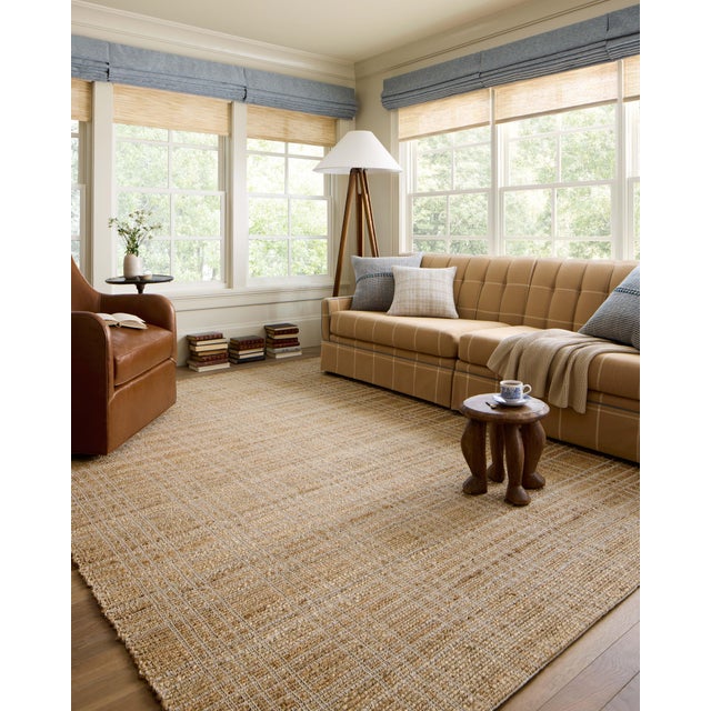 The Judy Collection from Chris Loves Julia x Loloi is a handwoven area rug made with natural fibers for an easygoing yet...