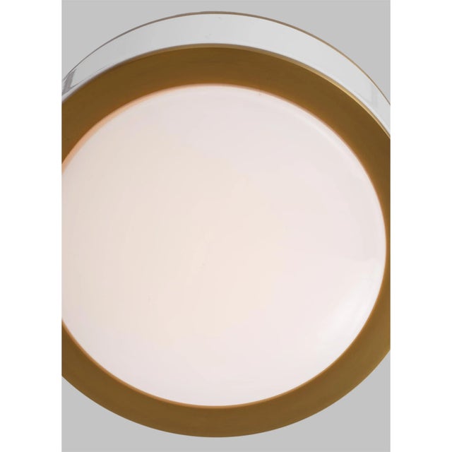 The Monroe LED flush mount is inspired by graphic enameled metal jewelry and decorative accessories from kate spade with a...
