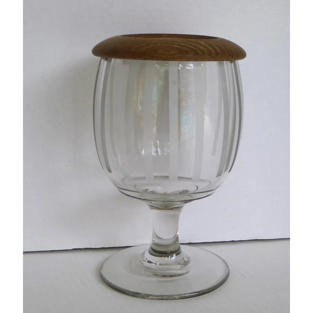 Very large glass Organic goblet vessel with a wood top from the 1950s. Vertical etched stripes on the outside of the bowl...