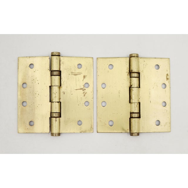 These ball bearing door hinges are made of solid brass with flat tips, five knuckles, and a template hole pattern. The...