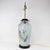 This antique Chinese porcelain vase has been converted into a stunning table lamp, featuring a beautifully hand-painted...