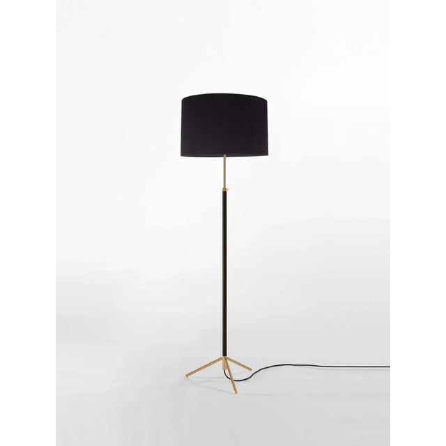 Black and brass pie de salón g2 floor lamp by jaume sans dimensions: d 45 x h 120-160 cm materials: metal, leather,...