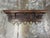 Design Plus Gallery presents an Antique Italian Walnut Carved Hanging Coat Rack. A molded upper shelf crowns a decorative...