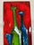 Nice colorfull ceramic wall decoration, Germany. Ceramic with a painting of stylized bottles in deep colours and a glossy...