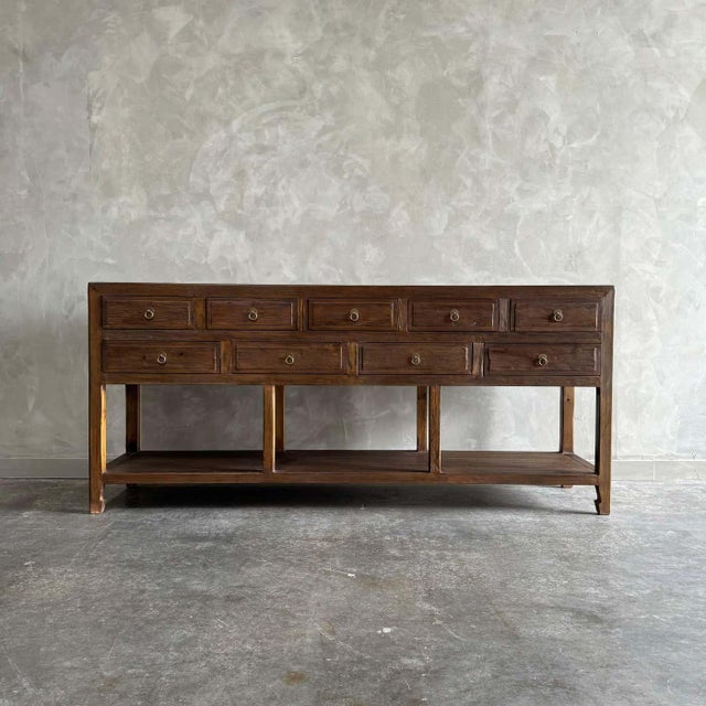 Our custom made console is a perfect blend of style and functionality. Crafted with reclaimed wood in a walnut finish,...