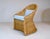 An exceptional pair of vintage braided wicker rattan armchairs with new custom seat cushions and goose down bolsters,...