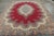 Made with hand-knotted wool circa 1930-1940, this 10x14 vintage Persian rug originating from Persia, hails from one of the...