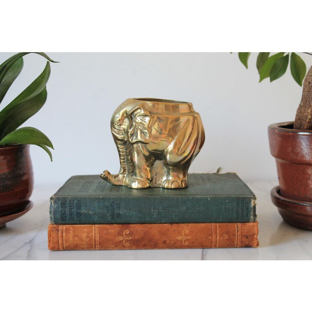 Vintage brass elephant desktop pen or pencil holder. Made in Taiwan. Makers mark on bottom. Patina.