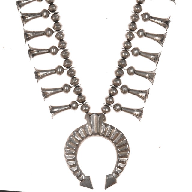 Della &amp; Francis James Navajo silver squash blossom necklace 23" long with no issues.<p></p><p></p>All precious metals...