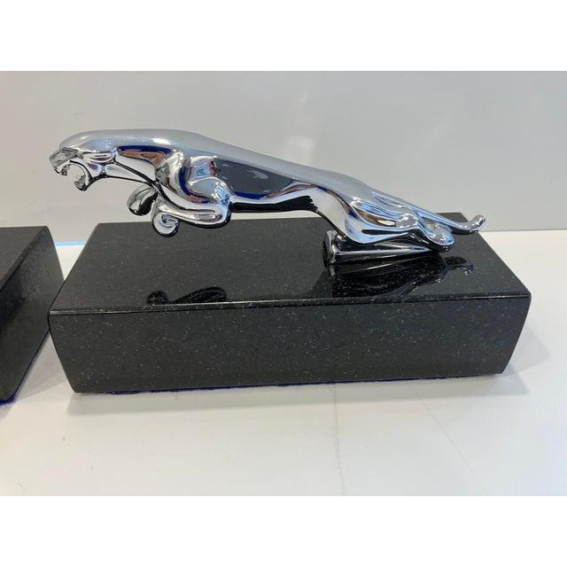 This pair of bookends feature jaguars on granite bases The jaguars are highly polished chrome The black granite bases are...