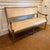 Elegant and timeless Niermann weeks Annecy bench. Wood frame with carved lion handles. Distressed camel and silver leaf...