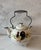 Vintage Japanese three footed tea pot with wire handle and featuring a hand painted rooster and sunflower design....