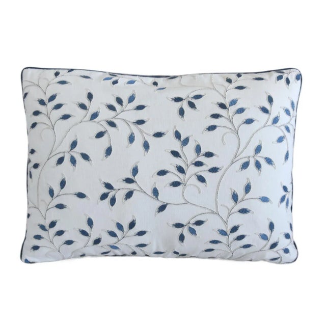 Custom-tailored pillow by Mike Seratt of The Prized Pig in Designer Page Turner embroidered blue sapphire leaf fabric...