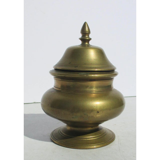 Cast and polished bronze lidded jar from Nepal or Northern India. Finely made and detailed in a series of fine bronze...