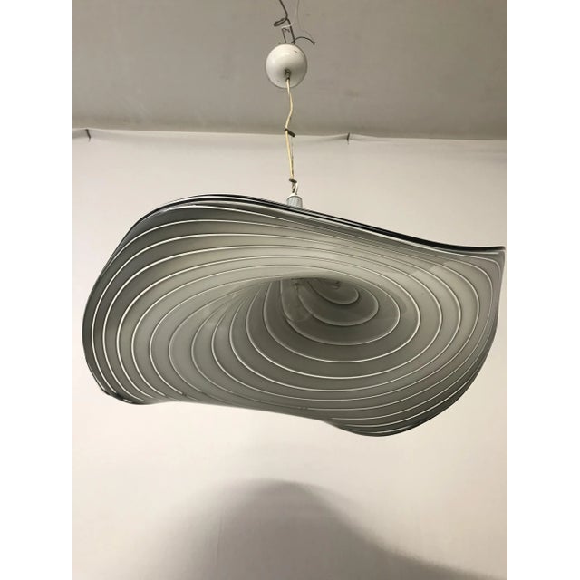 This handblown Murano glass hat pendant features one E27 socket. European Plug (up to 250V).The wiring of this item may be...