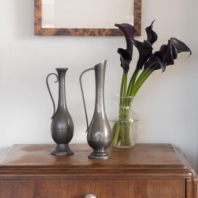 Lovely decorative pewter vase from France, 1930s. Sculptural shape with fluted rim and handle detail. Original finish...