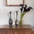 Lovely decorative pewter vase from France, 1930s. Sculptural shape with fluted rim and handle detail. Original finish...