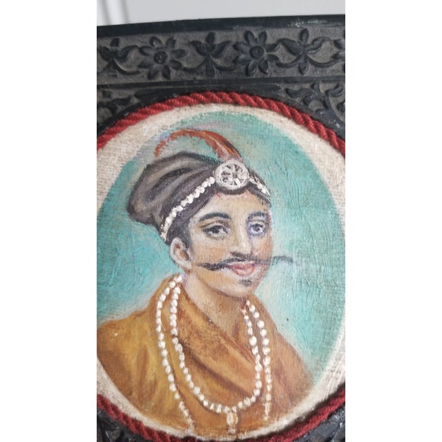 A beautiful oil painting of an Indian Maharaja in a beautifully hand carved ebony frame. Unsigned. Really well painted and...