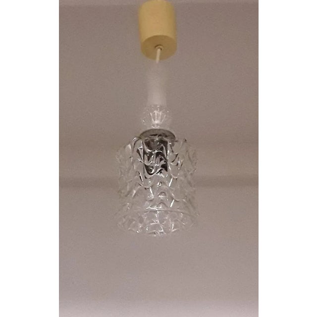 Vintage Ceiling Lamp Made of Clear Glass & Metal Mount, in Good conditions. Designed 1970 to 1979 European Plug (up to...