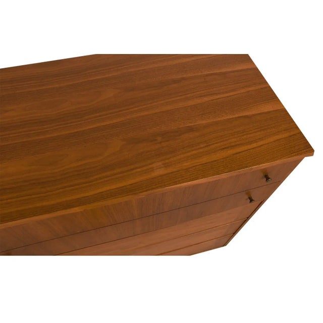 Attractive tall mid century modern sleek smooth face dresser. This is a very simple yet modern design. Each drawer has...