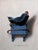 The Silver Finch by Patrick Nevins | Oil On Board Painting of a finch on a blue pedestal For Sale