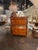 This product is a pair of French Empire walnut commodes. These chests have a classic French Empire design, featuring...