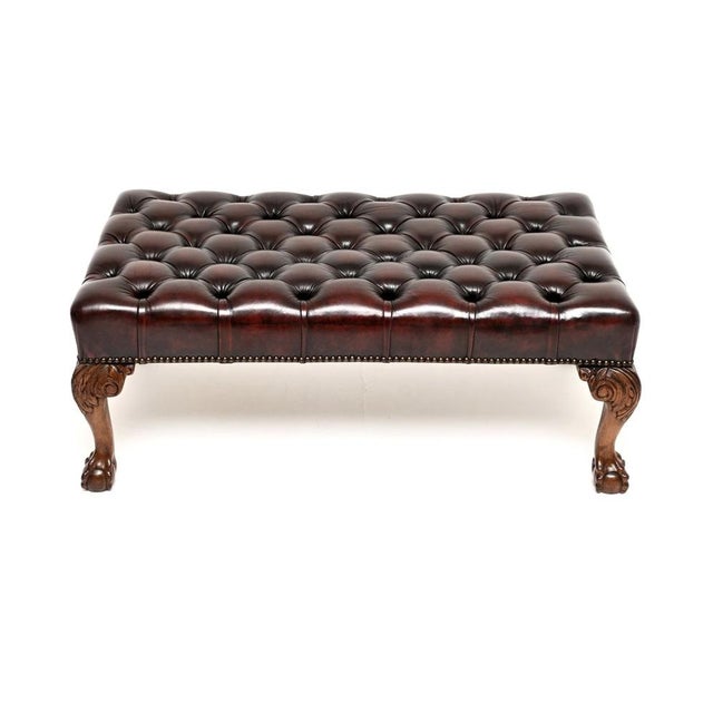A fantastic antique leather Chippendale style stool. This was made in England, it dates from around the 1930’s. It is of...