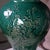 A striking ceramic vase created by Pottery 12, a renowned Hanoi-based ceramic artist known for sculptural carving and...