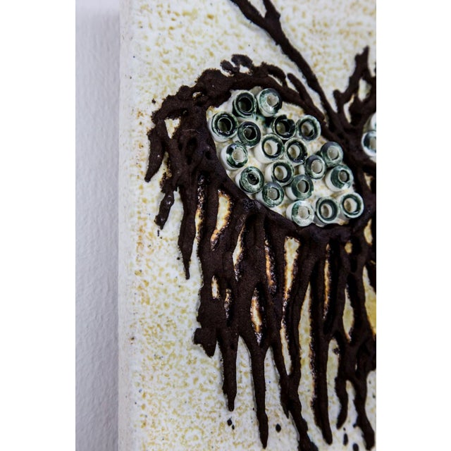 An authentic and rare vintage studio ceramic wall plaque designed and handcrafted by the acclaimed Hungarian applied...