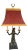 The lamp features a monkey wearing a red vest and hat with a red lamp shade trimmed in gold. The monkey holds two...