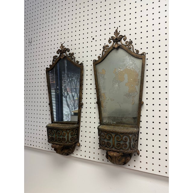 Pair of vintage hanging bronze and iron mirror planters supported by gilded acanthus leaves and gilt fleur-de-lis at...