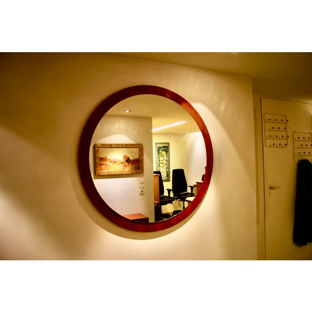 Very large Danish teak mirror from the 1960s, 93cm in diameter, in good condition This piece is attributed to the...
