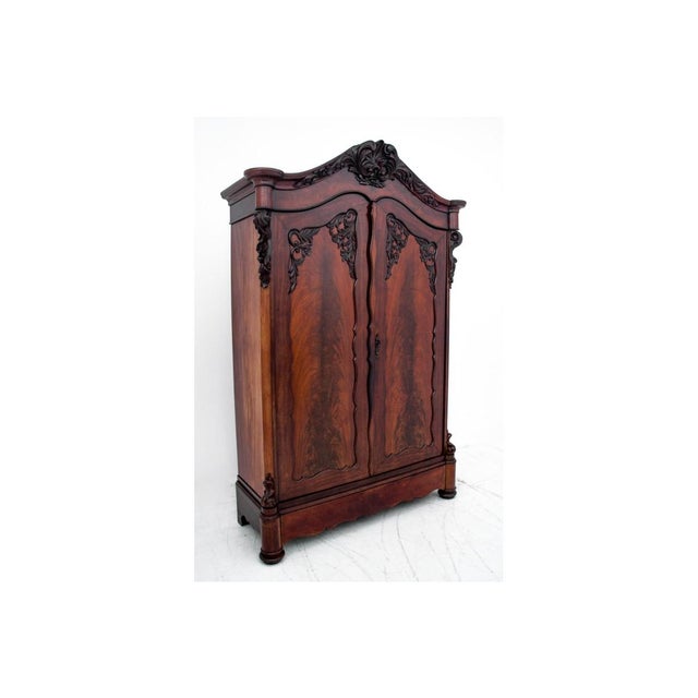 Antique wardrobe from around 1900. Very good condition. Wood: mahogany Dimensions: height 244 cm / width 162 cm / depth 62 cm