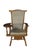 This vintage 1960s Heywood-Wakefield teacher's arm chair is a mid-century American classic crafted from solid maple in a...