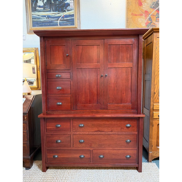 Design Plus Gallery presents a Nauvoo Bedroom Collection Media Armoire by Stuart David. The armoire is a fest to your eyes...