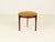 Stool or Footrest in Rosewood from Denmark. Frame in beautiful rosewood, upholstery in orange fabric. Made in Denmark,...