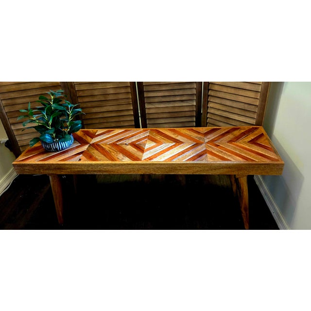 Width: 48 inches Height: 18 inches Depth: 14 inches A beautifully intricate Mid-Century Style Chevron Slatted Bench...