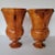 A large pair of Darrell Rhudy hand turned cedar vases measuring 14" high. Rhudy, b 1920, is known for his use of NC native...