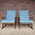 This is a pair of Ib Kofod Larsen for Selig Sled high back lounge chairs. They feature the high lattice back, walnut frame...