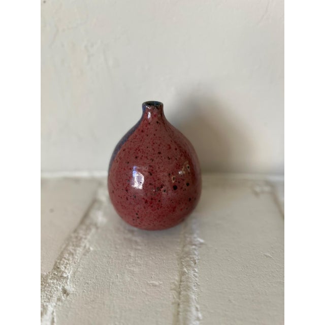 Hand-thrown studio pottery bud vase / weed pot, red and blue lava-speckled glaze, chop-marked, c.1970s-80s. Good vintage...