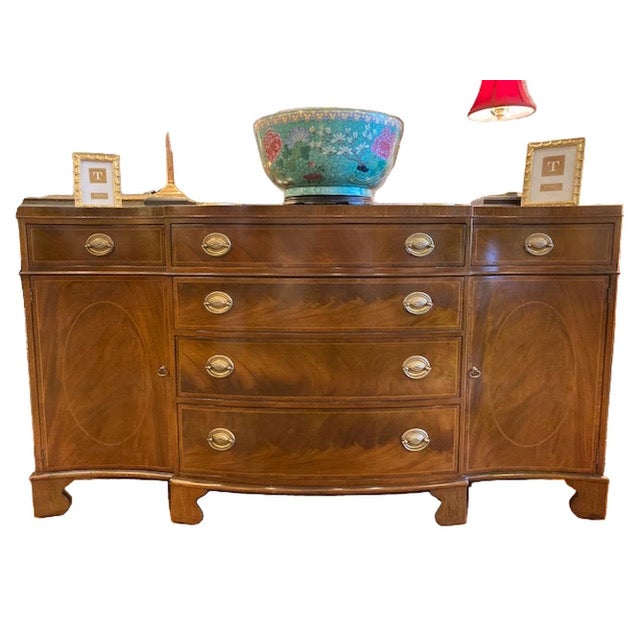 This Baker Serpentine Buffet is a great addition to your space as it provides ample storage four large drawers, two small...
