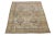 This exquisite, hand-knotted wool rug from Kerman boasts a charming antique finish. The rug's warm beige-tan color field...