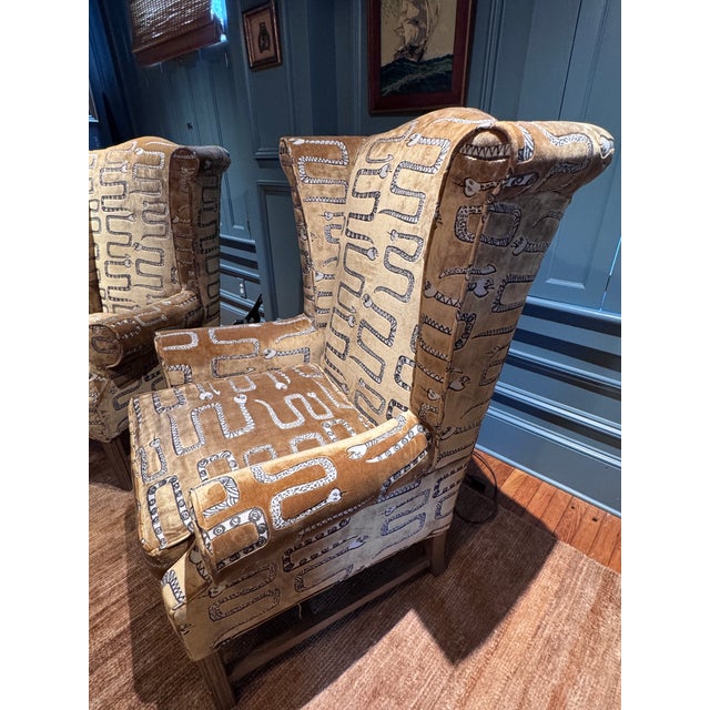 These are one of a kind newly upholstered wing chairs in a quirky snake pattern. The velvet is super soft and plush. The...