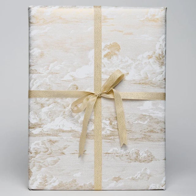 Lusciously thick, this wrapping paper creases and folds beautifully and is richly printed with Schumacher’s Cloud Toile...