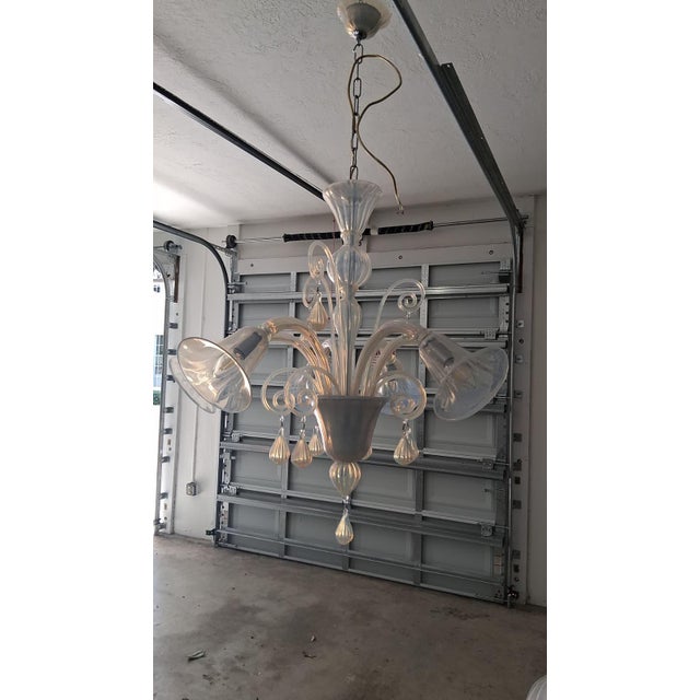 This is a stunning example of Venetian Murano glass craftsmanship, featuring a classic yet ethereal aesthetic. Its...