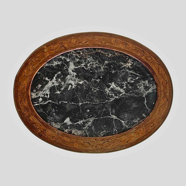 Antique French Louis XVI-style marquetry and ormolu-mounted occasional table, featuring floral inlay veneer, a brass-...