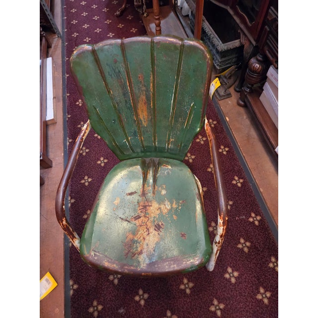 A wonderful chair for outside or inside. The metal has been sealed and the rust is topical but not affecting the sturdy...